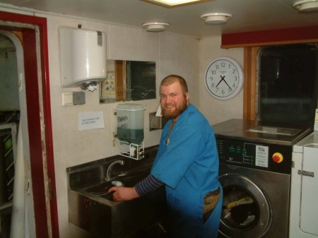 Jake doing his cleaning duties. Jake and Aaron are responsible for keeping the changing room tidy. The rest of the crew are all allocated different parts of the ship on their cleaning roster.